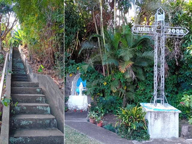 Le long escalier du Chemin des Calumets finit à la croix du Jubilée 2000 et son oratoire
